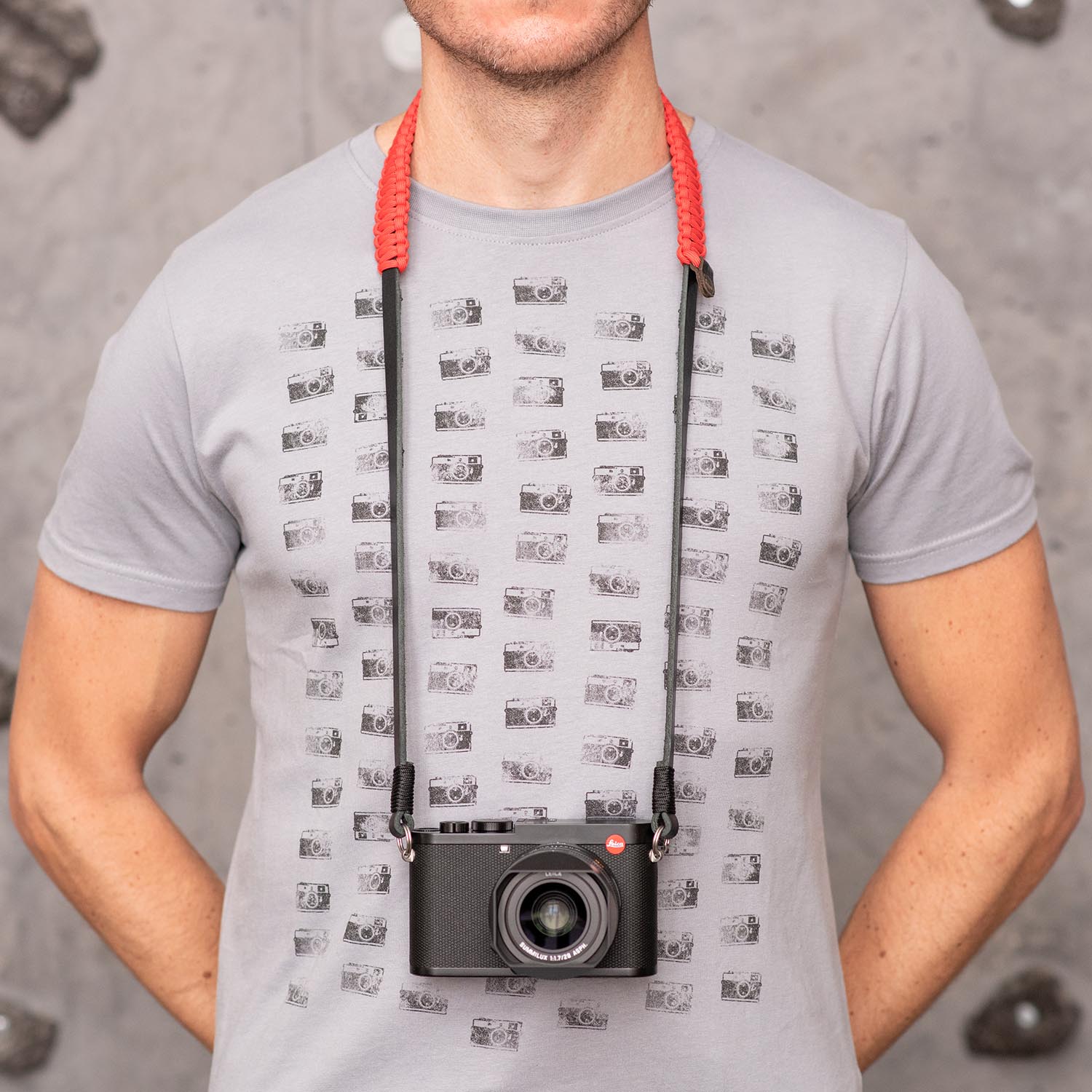 Photographer wearing Leica Paracord Strap