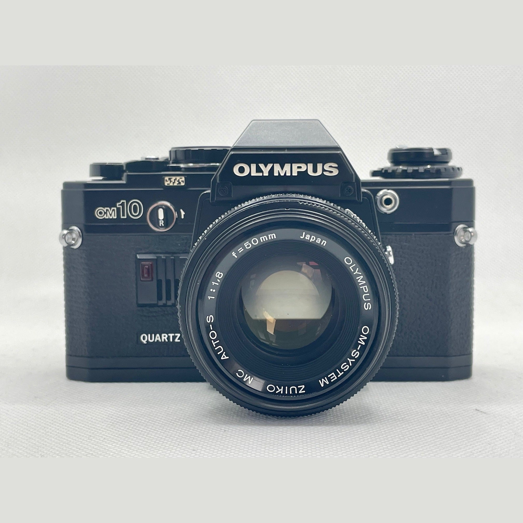 Olympus OM-10 50mm 1.8 Black – SLR Camera – IMG Imageplayground